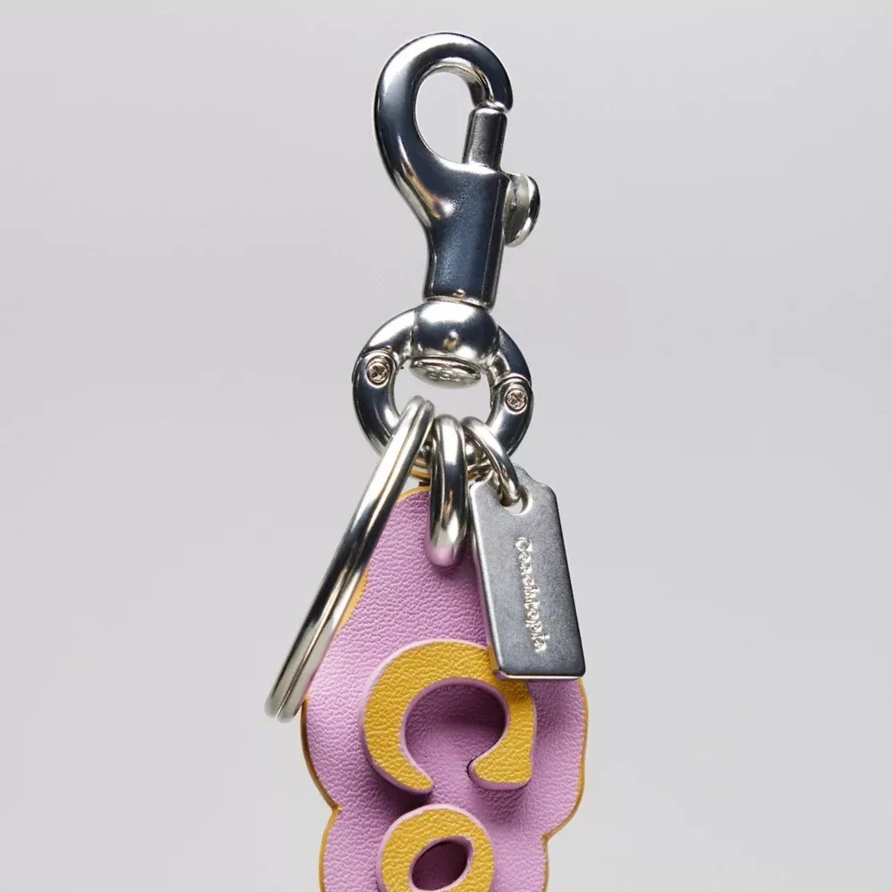 Coach Coachtopia Logo Bag Charm in Violet Orchid/Flax Coachtopia Leather NWT - Picture 11 of 16